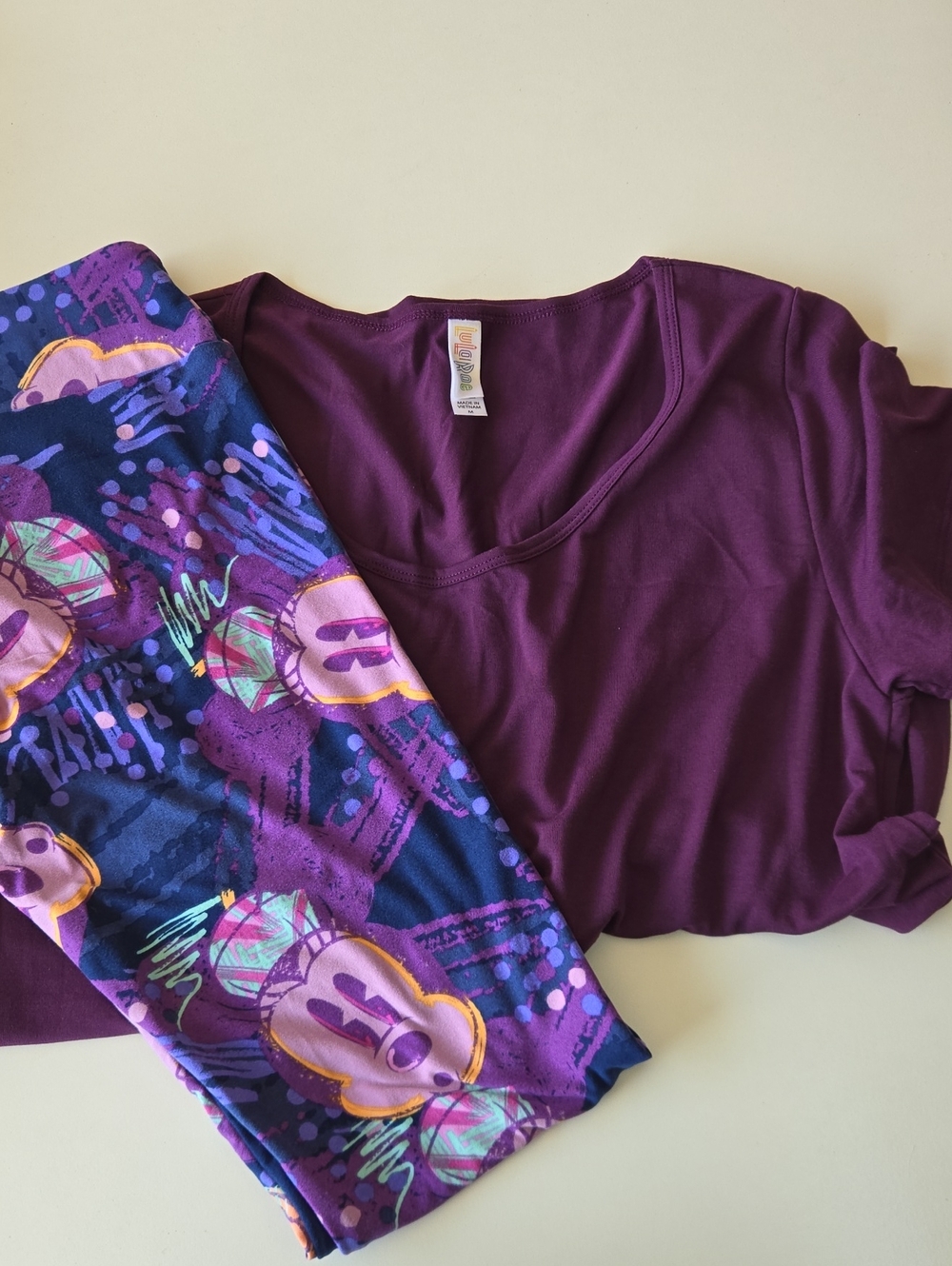 LuLaRoe Purple Scoop Neck Top with Printed Purple & Navy Leggings